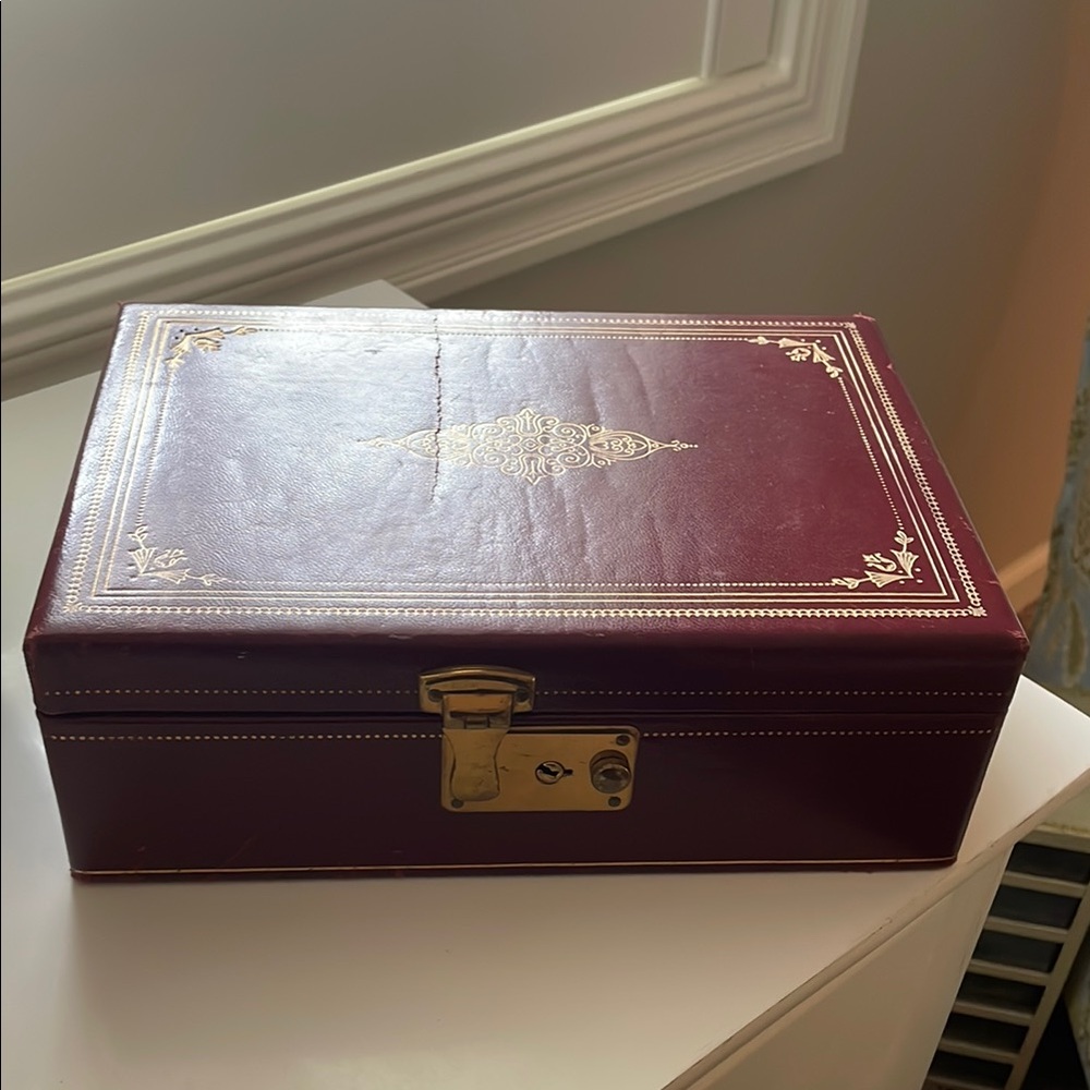 Elegant Burgundy Jewelry Box with Gold Accents